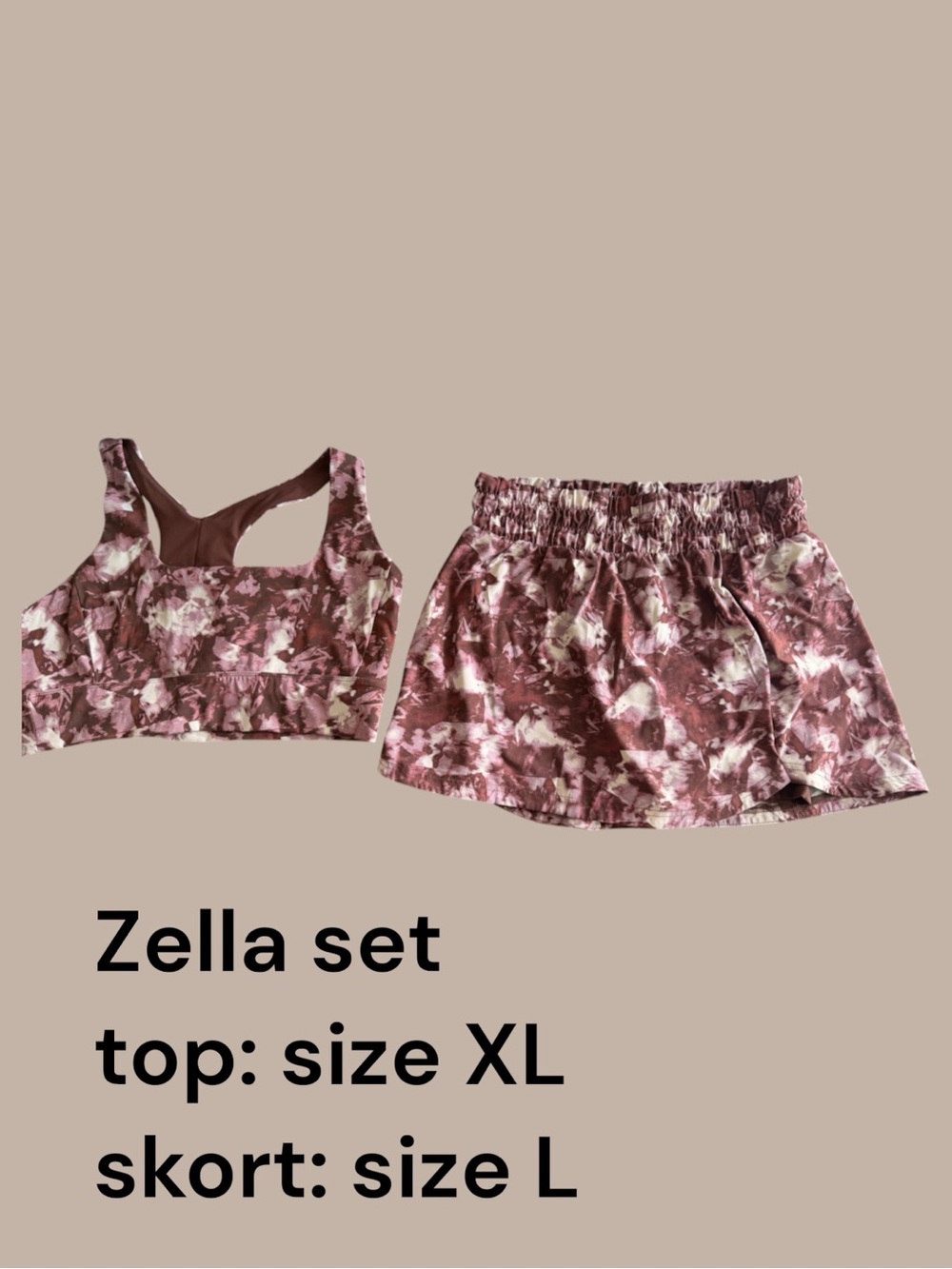 Zella matching sports bra and skirt set. Top size XL Skort size Large